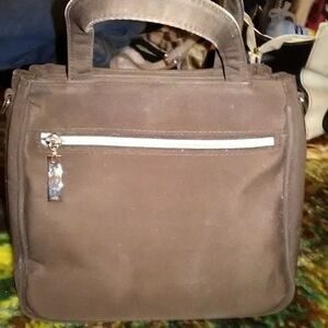 Small brown handbag with different compartments